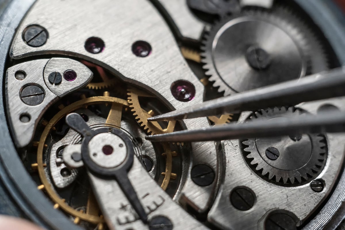 Watchmaker is repairing the wristwatch, mechanical watch